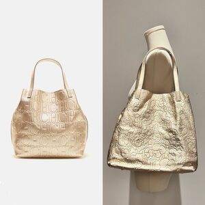 Carolina Herrera Gold Embossed Matryoshka Bag